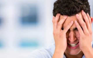 What is vertigo? What are common vertigo symptoms and treatment? 1 picture of a man with migraine