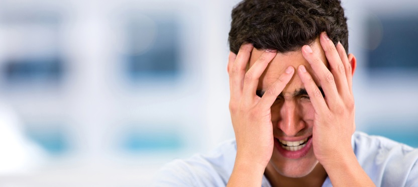 Picture of a man with headache and migraine