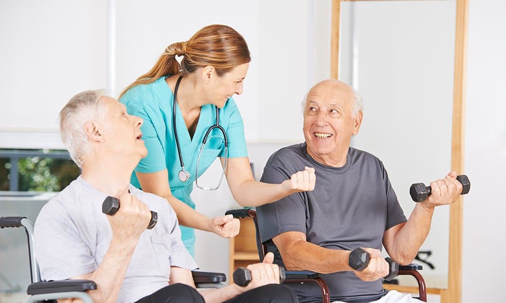 doctor helping elderly men