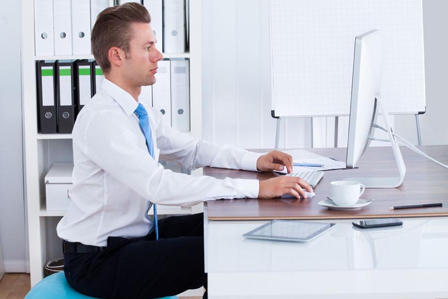 Man sitting at a computer