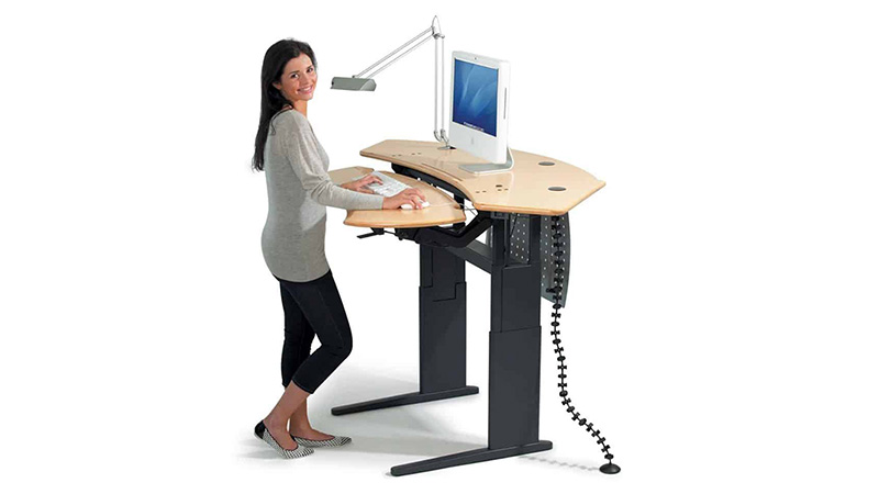 Standing-work-stations picture of a woman at a stand up desk