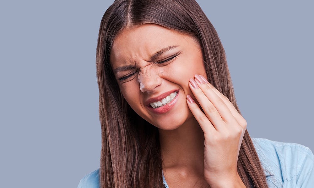 Picture of a woman with jaw pain