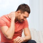 man with shoulder pain