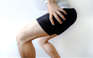 3 excellent ways we can help with your arthritic pain 5 Picture of a man suffering from a hamstring injury or strain