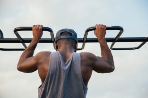 Image of a man doing pull up