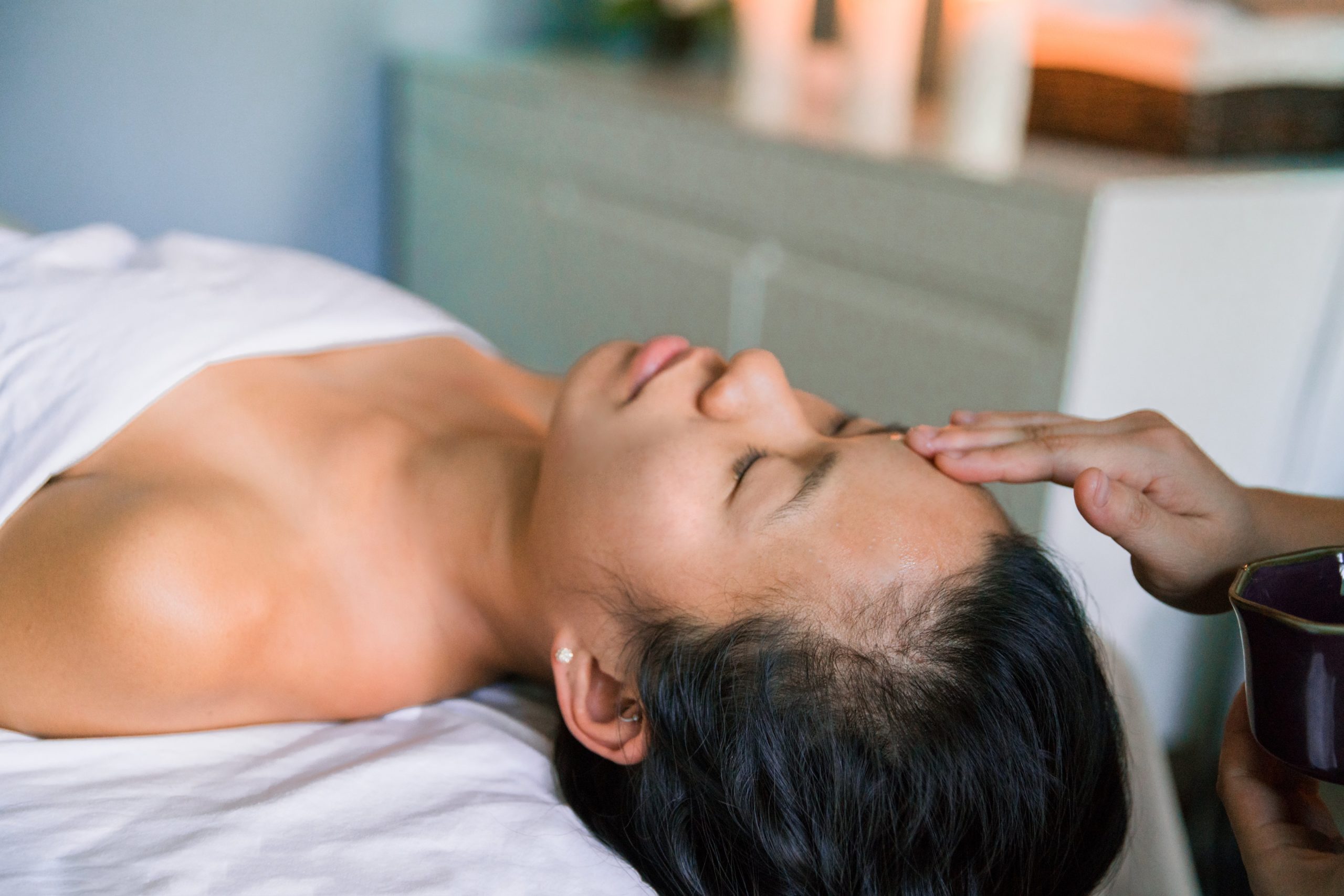 Picture of woman getting forehead massage