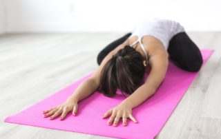 woman doing childs pose