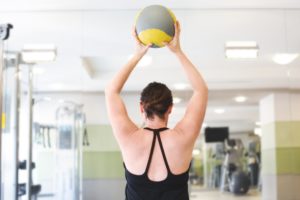 woman lifting overhead