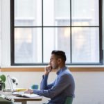 Man sitting at a computer