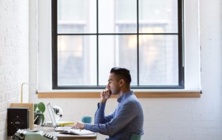 Man sitting at a computer