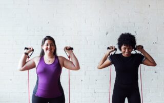 woman strong band exercise