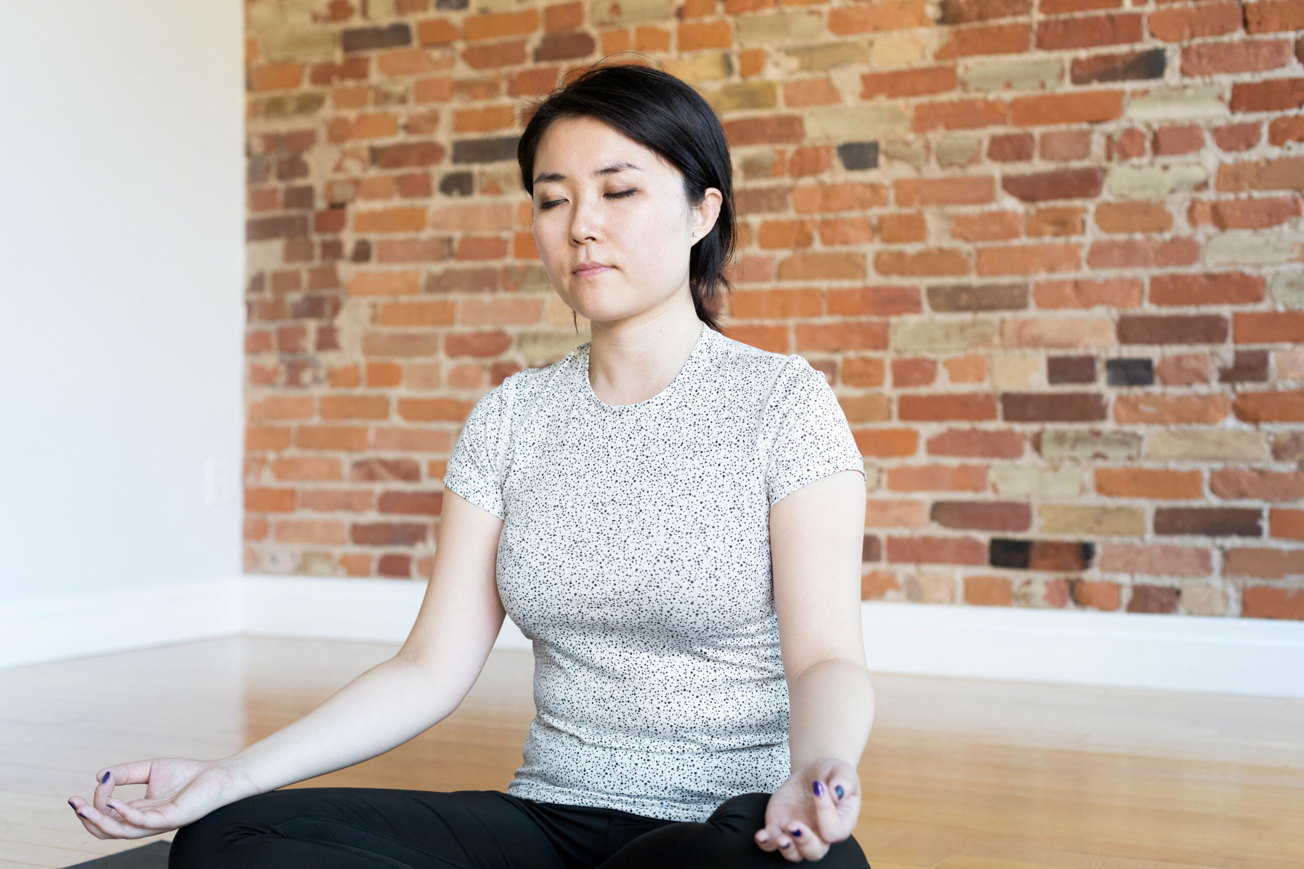 picture of a woman doing deep breathing exercises