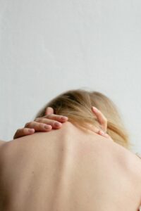 woman with neck pain due to whiplsh injury