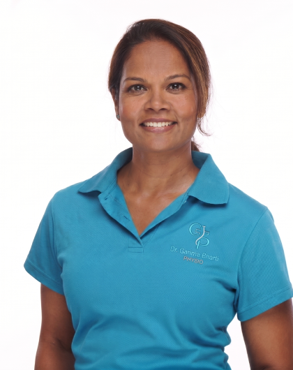 Garima Bharti Smiling woman in a blue polo shirt with a company logo, posing against a white background.
