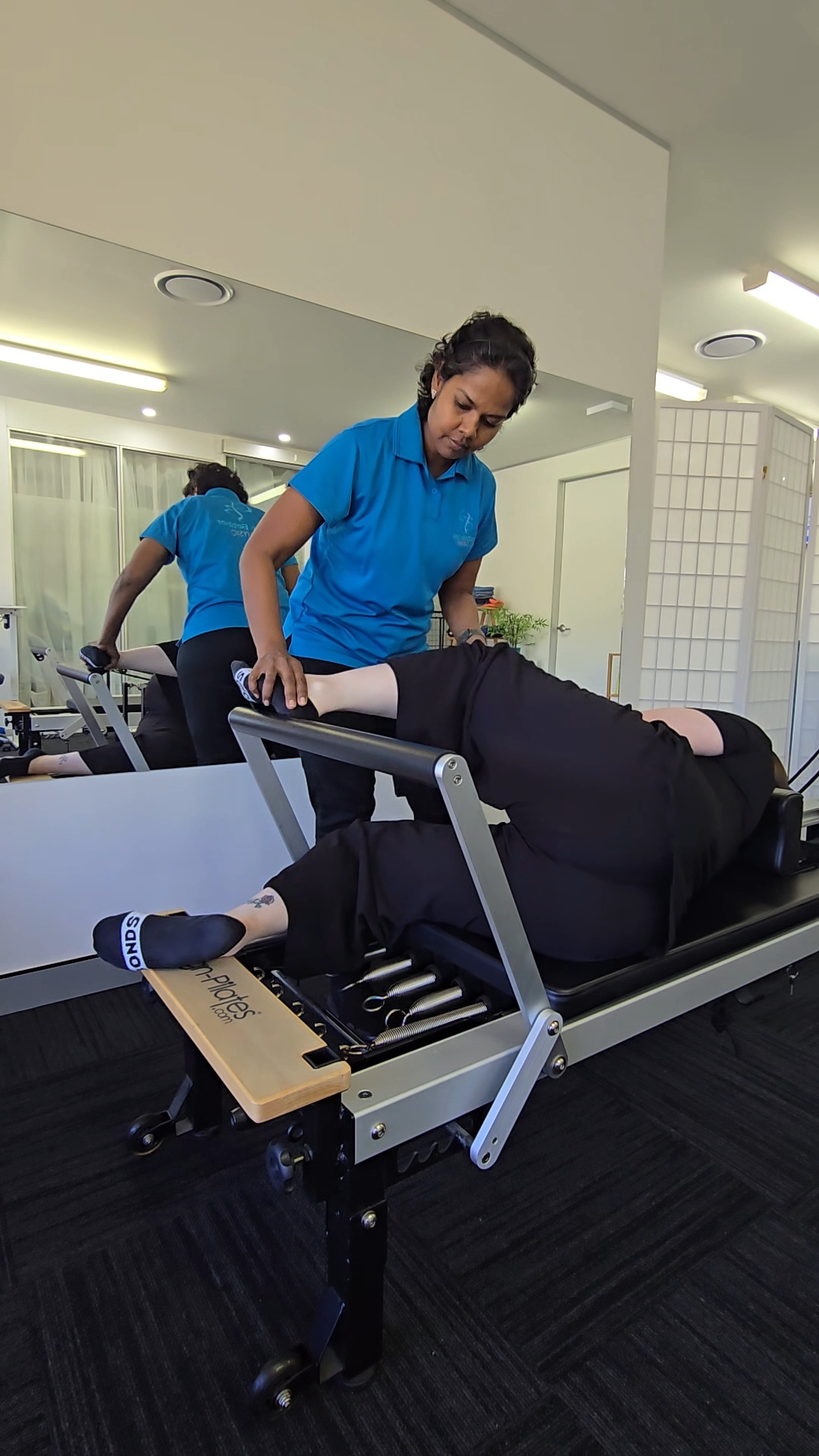 Neck Pain Physiotherapy Brisbane South: 8 or 12-Week Plan 4 Reformer Pilates session in your studio, with the physio guiding a client