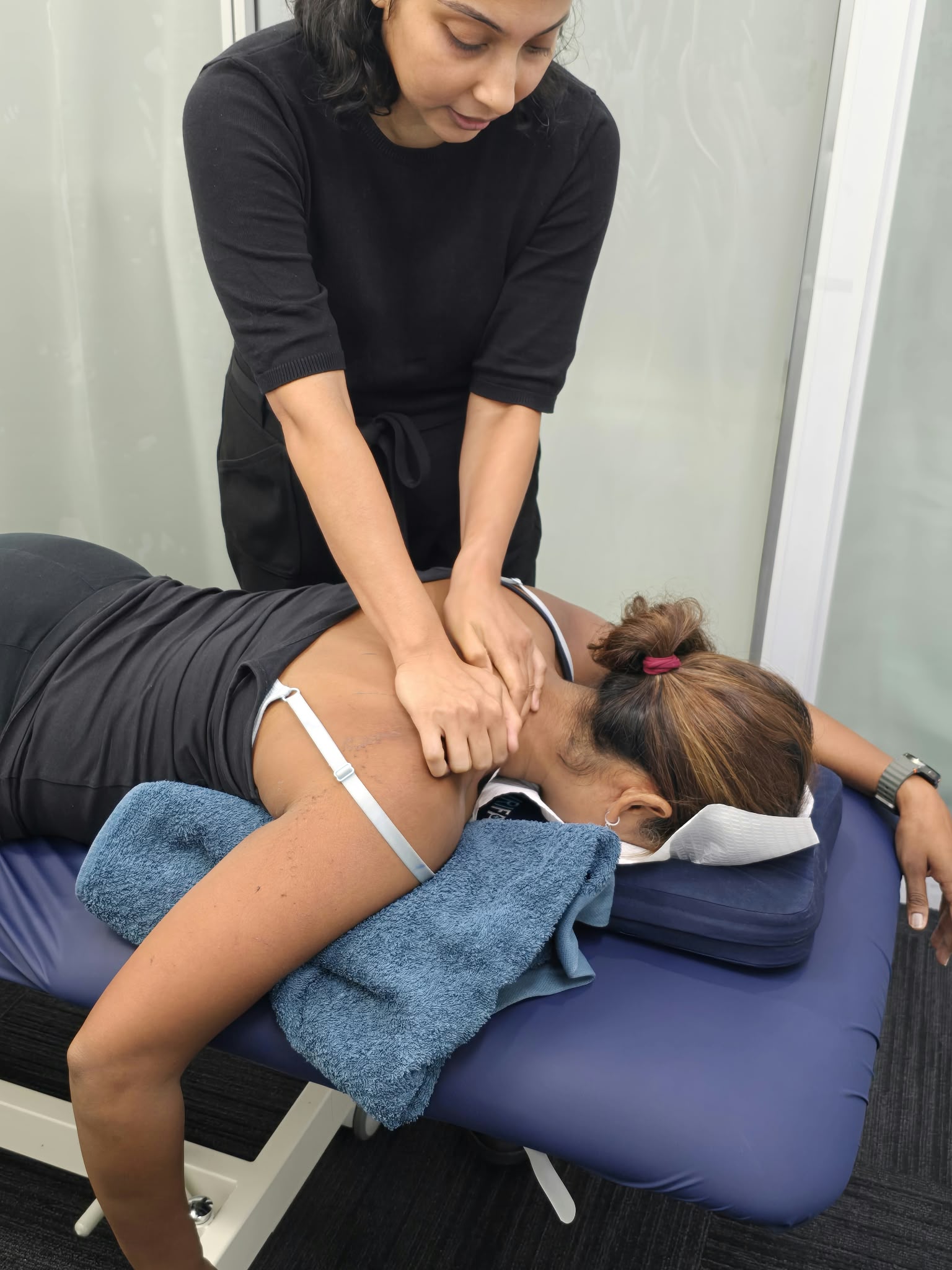 Neck Pain Physiotherapy Brisbane South: 8 or 12-Week Plan 3 Physiotherapist assessing neck pain at Get Better Physiotherapy Regents Park